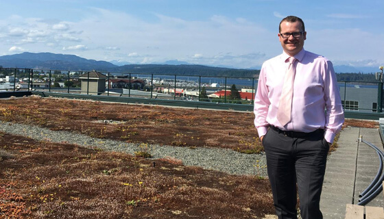 Chris Osborne, Acting Supervisor, Long Range Planning and Sustainability, Campbell River on green roof on Campbell River’s City Hall